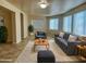 Spacious living room with neutral walls, plush rug, and modern seating arrangement at 1001 W 17Th St, Tempe, AZ 85281