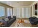 Relaxing living room with modern furnishings, white shutters, and bright, natural light at 1001 W 17Th St, Tempe, AZ 85281