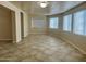 Bright living room with neutral tones, tile flooring, and lots of natural light at 1001 W 17Th St, Tempe, AZ 85281