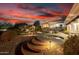 Expansive backyard featuring a pool, spa, seating areas, and lush landscaping at 10800 E Cactus Rd # 7, Scottsdale, AZ 85259