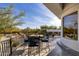 Balcony with wrought iron railing and outdoor seating at 10800 E Cactus Rd # 7, Scottsdale, AZ 85259