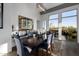 Dining room area with ample natural light and stylish dining table and chairs at 10800 E Cactus Rd # 7, Scottsdale, AZ 85259