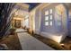 Inviting home entrance with desert landscape, decorative shrubbery, and exterior architectural features at 10800 E Cactus Rd # 7, Scottsdale, AZ 85259