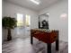 Game room featuring foosball table, and an adjacent room with arcade games and bright lighting at 10800 E Cactus Rd # 7, Scottsdale, AZ 85259