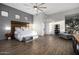 Spacious main bedroom with a wood-accent headboard, modern furnishings, and ample natural light at 10800 E Cactus Rd # 7, Scottsdale, AZ 85259