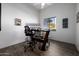 Office with window and hardwood floors, with a contemporary desk and an adjustable stool at 10800 E Cactus Rd # 7, Scottsdale, AZ 85259