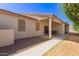 Large backyard with a covered patio and ample space for outdoor activities and entertainment at 10960 E Monte Ave # 164, Mesa, AZ 85209
