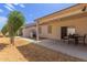 Expansive backyard with a covered patio area perfect for outdoor dining and relaxation at 10960 E Monte Ave # 164, Mesa, AZ 85209