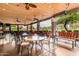 Image of a large covered outdoor patio area featuring seating, tables, and ceiling fans at 10960 E Monte Ave # 164, Mesa, AZ 85209