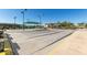 Shuffleboard area, with benches and awnings, in a neighborhood with various amenities at 10960 E Monte Ave # 164, Mesa, AZ 85209