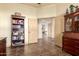 Bright home office featuring built-in bookcase and an open doorway leading to other rooms at 11351 E Pampa Ave, Mesa, AZ 85212