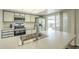 Well-lit kitchen with modern appliances, a breakfast bar, and light countertops at 12243 S Chippewa Dr, Phoenix, AZ 85044