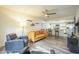 Living room featuring modern floors with view of the kitchen at 12243 S Chippewa Dr, Phoenix, AZ 85044