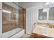 Bathroom showcasing a tiled shower, updated vanity, and modern fixtures at 12647 S 41St Pl, Phoenix, AZ 85044