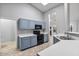 Kitchen featuring blue cabinetry and tile flooring at 12647 S 41St Pl, Phoenix, AZ 85044