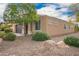 Well-kept front exterior with neat landscaping showcasing beautiful curb appeal at 12957 W Hummingbird Ter, Peoria, AZ 85383