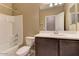 Full bathroom with a shower-tub combination, vanity and toilet at 13812 W Remuda Dr, Peoria, AZ 85383