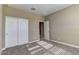 Bedroom with carpet, closet and neutral walls with a bright window at 13812 W Remuda Dr, Peoria, AZ 85383