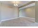 Open dining area featuring tile flooring and a stylish chandelier at 13812 W Remuda Dr, Peoria, AZ 85383