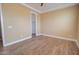 Empty bedroom with tile flooring, neutral walls, a ceiling fan, and walk in closet at 14161 S Palo Verde Trl, Casa Grande, AZ 85193