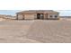 Attractive home with a three-car garage and paved driveway, offering ample parking space at 14161 S Palo Verde Trl, Casa Grande, AZ 85193