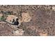 Aerial view of desert estate, showcasing premium location with expansive grounds at 14360 E Desert Cove Ave, Scottsdale, AZ 85259