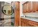 Functional laundry room featuring high-end washer/dryer, ample storage and countertop space at 14360 E Desert Cove Ave, Scottsdale, AZ 85259