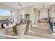 Bright living room featuring stylish seating and decorative accents, complemented by scenic mountain views at 14360 E Desert Cove Ave, Scottsdale, AZ 85259