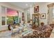 Inviting living room featuring mountain views, elegant furnishings, and abundant natural light at 14360 E Desert Cove Ave, Scottsdale, AZ 85259