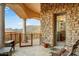 Charming outdoor patio with brick accents, mountain views, and comfortable seating at 14360 E Desert Cove Ave, Scottsdale, AZ 85259