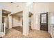 Spacious entryway featuring tile flooring, high ceilings, and neutral paint at 14544 W Sierra St, Surprise, AZ 85379
