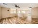 Upstairs loft featuring wood flooring, neutral paint, and natural lighting from the windows at 14544 W Sierra St, Surprise, AZ 85379