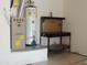 Garage featuring a water heater, furnace, and workbench area at 15104 W Pinehurst W Ln, Surprise, AZ 85374