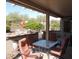 Patio with dining set and desert landscaping at 15104 W Pinehurst W Ln, Surprise, AZ 85374
