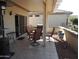 Outdoor patio area featuring dining set and BBQ at 15104 W Pinehurst W Ln, Surprise, AZ 85374