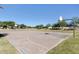 Outdoor basketball court in a well-maintained community park on a sunny day at 15412 W Port Royale Ln, Surprise, AZ 85379