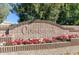 Welcome to Countryside! Community entrance sign adorned with colorful flowers at 15412 W Port Royale Ln, Surprise, AZ 85379