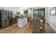 Stylish kitchen and dining area with stainless steel appliances and granite countertops at 18841 E Pelican Ct, Queen Creek, AZ 85142