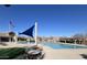 Large community pool with lap lanes, shade structures, lounge chairs and tables at 20040 E Kestrel St, Queen Creek, AZ 85142