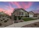 Charming single-Gathering home with manicured lawn, beautiful landscaping and an attached garage at 20040 E Kestrel St, Queen Creek, AZ 85142