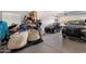 Spacious two-car garage with epoxy flooring provides ample parking and storage space at 20040 E Kestrel St, Queen Creek, AZ 85142