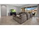 Spacious living room with a large sliding glass door and comfortable seating at 20040 E Kestrel St, Queen Creek, AZ 85142