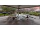 Shaded picnic area with multiple tables and a grill, perfect for outdoor gatherings at 20040 E Kestrel St, Queen Creek, AZ 85142