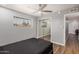 Bedroom featuring a ceiling fan and sliding mirror closet doors at 2015 E Southern Ave # 2, Tempe, AZ 85282