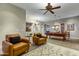 Expansive game room with comfortable seating, pool table, and unique decorative accents at 20331 N Fletcher Way, Peoria, AZ 85382
