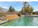 Backyard pool with a waterfall feature, set in a well-designed outdoor space at 20331 N Fletcher Way, Peoria, AZ 85382