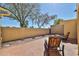 View of a private brick paved patio with outdoor seating and mature shade trees, perfect for outdoor enjoyment at 2102 W Marlette Ave, Phoenix, AZ 85015
