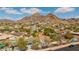 Neighborhood aerial view showcasing mountain views in the distance at 2202 E Lincoln Dr, Phoenix, AZ 85016
