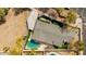 Stunning aerial view of the property showcasing a private pool and lush landscaping at 2202 E Lincoln Dr, Phoenix, AZ 85016