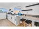 Bright bar area featuring ample countertop space, storage, and natural light at 2202 E Lincoln Dr, Phoenix, AZ 85016